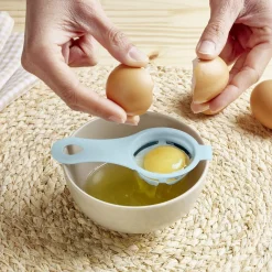 Séparateur blanc d'oeuf plastique bleu ou rose